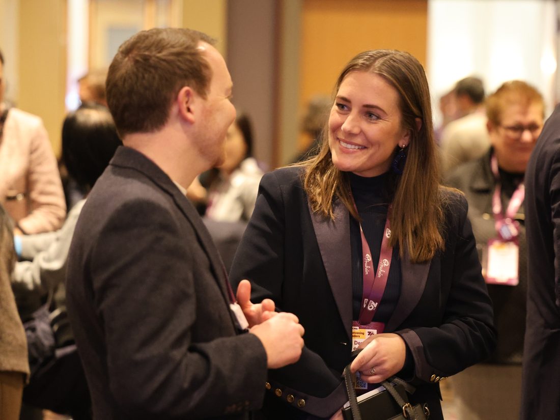 PCMA professionals in conversation at an event